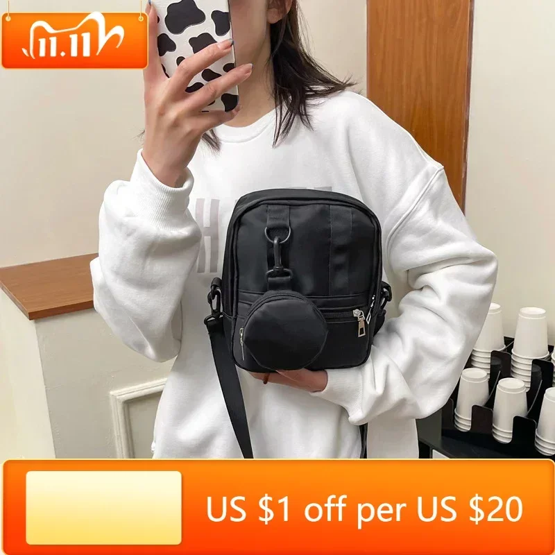 Nylon Shoulder Bags Women Casual Wide Strap Messenger Bag with Mini Round Wallet Pendant Fashion Handbag Crossbody Bags
Nylon Shoulder Bags Women Casual Wide Strap Messenger Bag with Mini Round Wallet Pendant Fashion Handbag Crossbody Bags