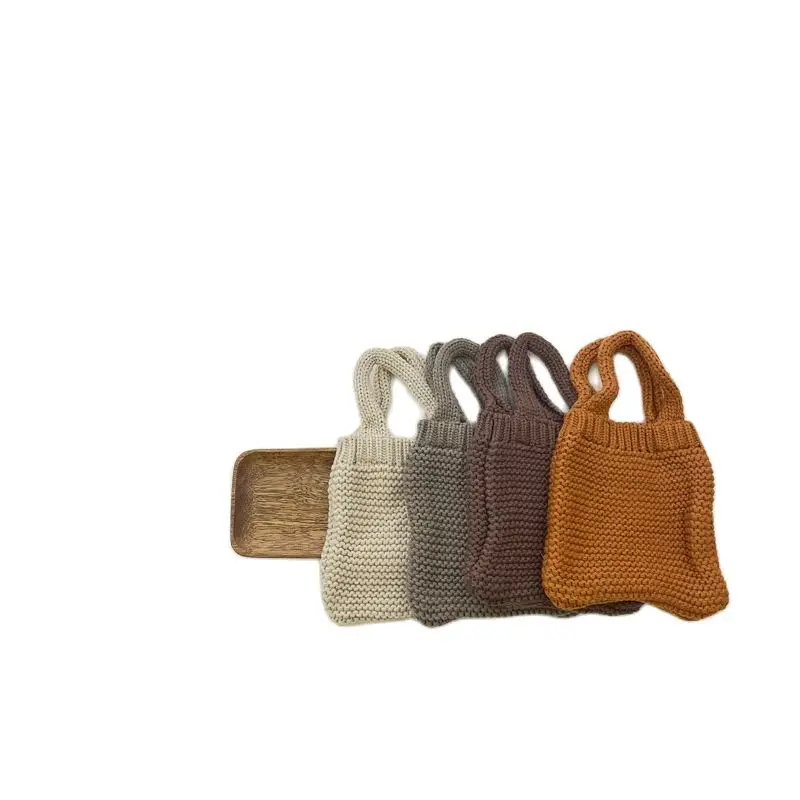 Детская сумка 2022 Корейская версия Осень и зима простая вязаная сумка для мальчиков и девочек винтажная сумка Детские Сумки 
Детская сумка 2022 Корейская версия Осень и зима простая вязаная сумка для мальчиков и девочек винтажная сумка Детские Сумки