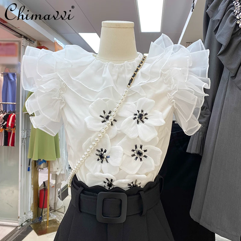 2022 Summer New Fashion Design Three-Dimensional Flower Beaded Ruffled Shirt Slimming Elegant White Vest Top Ladies Blouse
2022 Summer New Fashion Design Three-Dimensional Flower Beaded Ruffled Shirt Slimming Elegant White Vest Top Ladies Blouse