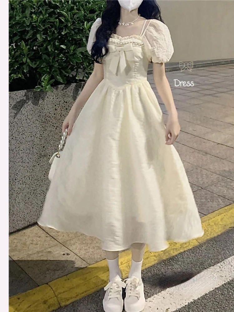 Yellow Elegant Fairy Midi Dress Women Bow Korean Fashion Sweet Princess Dress Female Casual Puff Sleeve Party Dress Summer 2022
Yellow Elegant Fairy Midi Dress Women Bow Korean Fashion Sweet Princess Dress Female Casual Puff Sleeve Party Dress Summer 2022