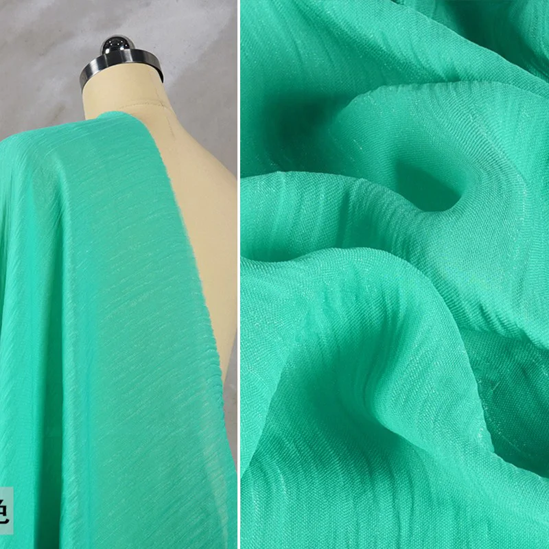 Lake green nylon polyester flash crepe breathable bright silk elegant crimped texture fabric dress Hanfu design fabric
Lake green nylon polyester flash crepe breathable bright silk elegant crimped texture fabric dress Hanfu design fabric
