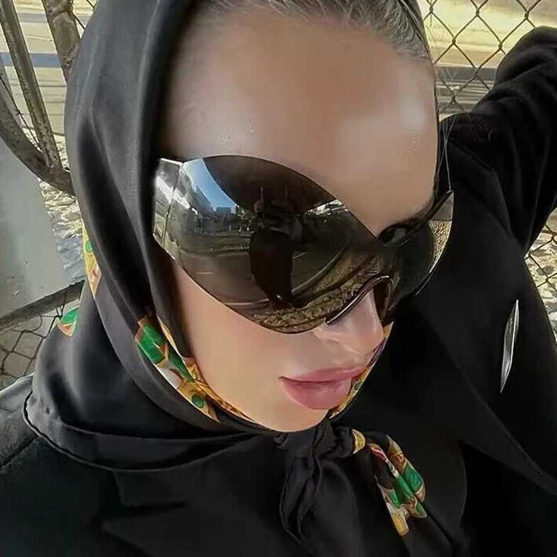 Vintage Y2K Oversized Rimless Sunglasses Women For Men Fashion Luxury Brand Design One Piece Sun Glasses Trend Steampunk Shades
Vintage Y2K Oversized Rimless Sunglasses Women For Men Fashion Luxury Brand Design One Piece Sun Glasses Trend Steampunk Shades