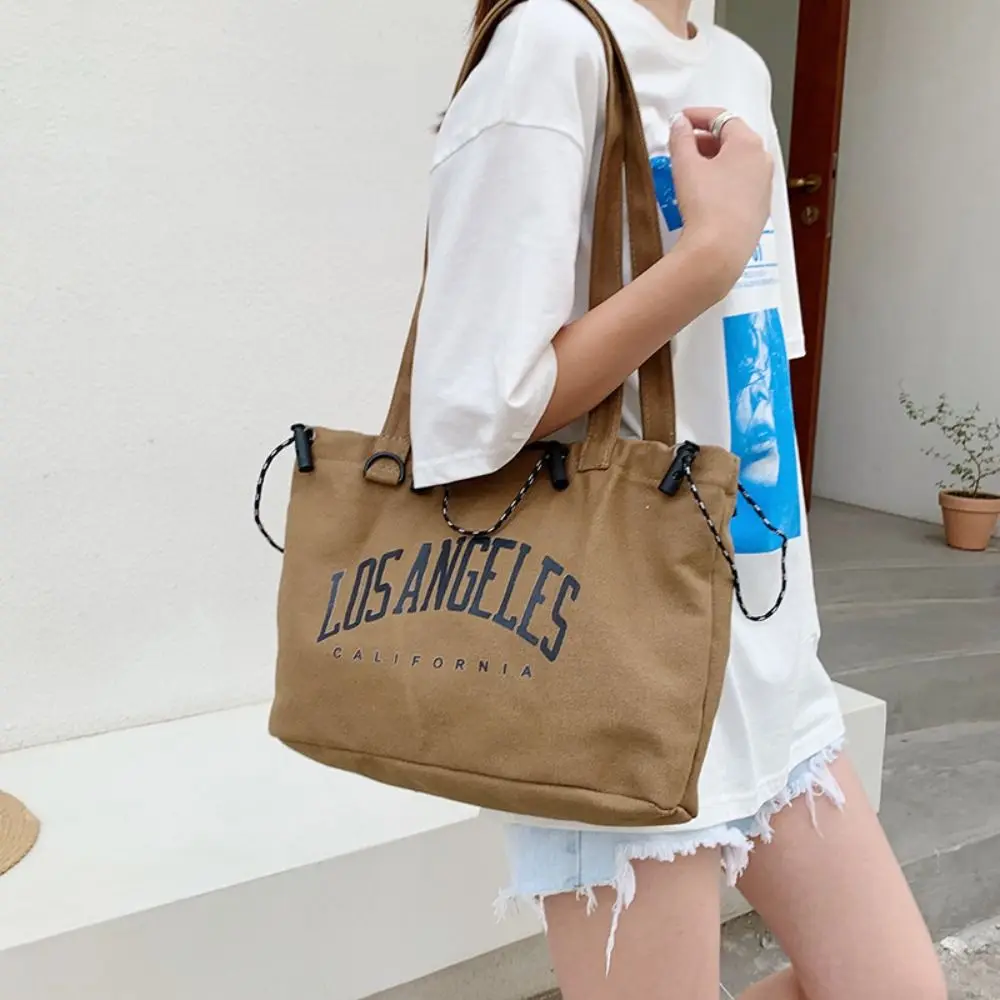 Сумка-мессенджер для девушек и студентов, модная брендовая тканевая сумка с надписью, модная брендовая женская сумка на плечо, Холщовая Сумка-тоут 
Сумка-мессенджер для девушек и студентов, модная брендовая тканевая сумка с надписью, модная брендовая женская сумка на плечо, Холщовая Сумка-тоут