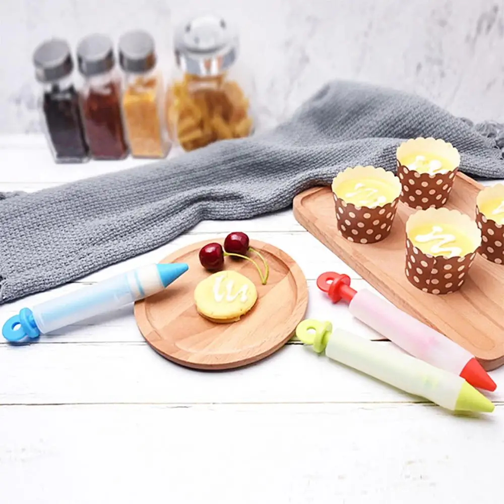 5Pcs/Set Cake Mold Cream Dessert Decorators Silicone Pastry Nozzle Food Writing Pen Chocolate Decorating Tool Baking Accessory
5Pcs/Set Cake Mold Cream Dessert Decorators Silicone Pastry Nozzle Food Writing Pen Chocolate Decorating Tool Baking Accessory