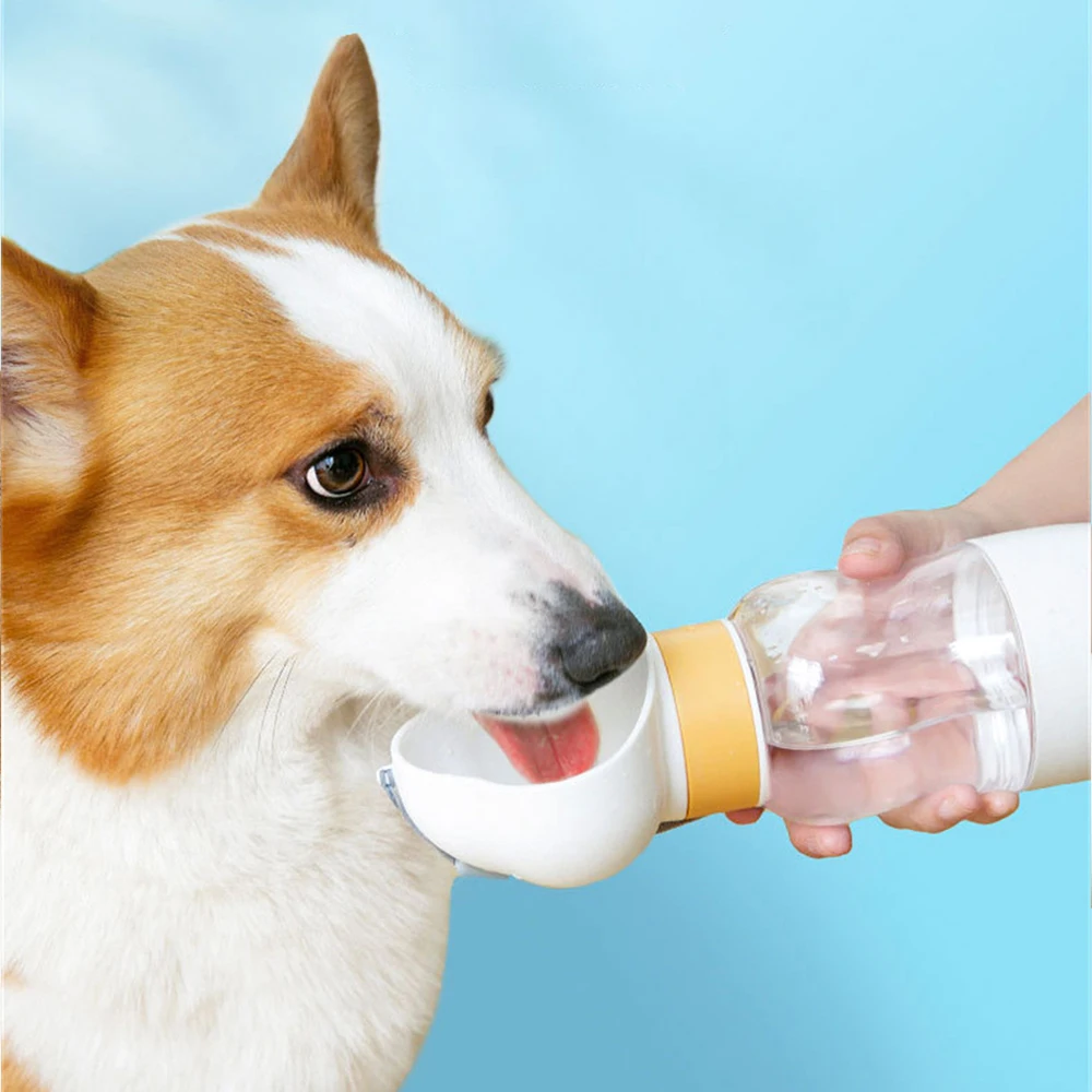 Pet Water Bottle Feeder Outdoor Food Bowl For Cat Dogs Travel Drinking Kettle With Handle Portable Mug Pets Supplies
Pet Water Bottle Feeder Outdoor Food Bowl For Cat Dogs Travel Drinking Kettle With Handle Portable Mug Pets Supplies