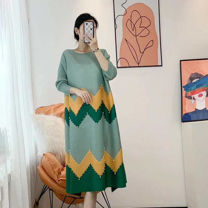 Miyake Pleated Dress Woman 2022 Spring Autumn Fashion Splicing Beads Elegant Round Neck and Long Sleeves Loose Women Clothing 
Miyake Pleated Dress Woman 2022 Spring Autumn Fashion Splicing Beads Elegant Round Neck and Long Sleeves Loose Women Clothing