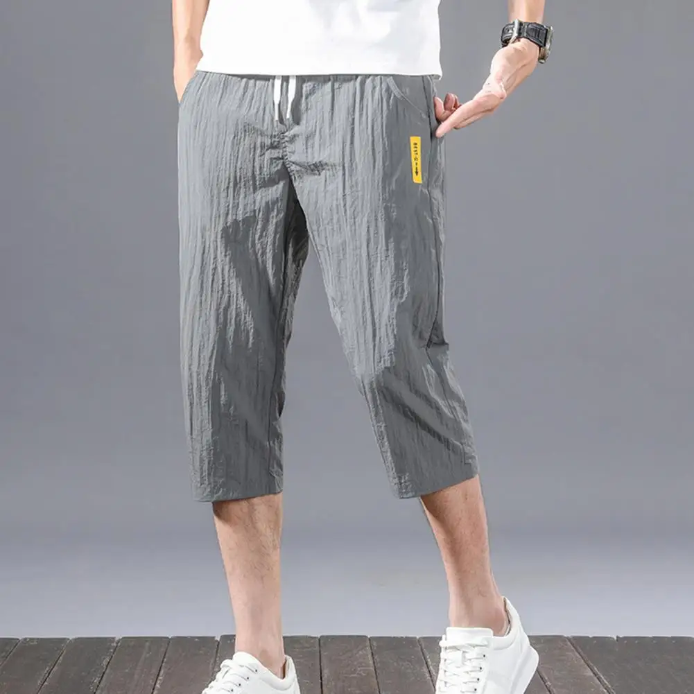 

Trendy Wear-resistant Solid Color Slim Fit Elastic Waist Deep Crotch Men Cropped Pants Summer Jogger Pants Young Style