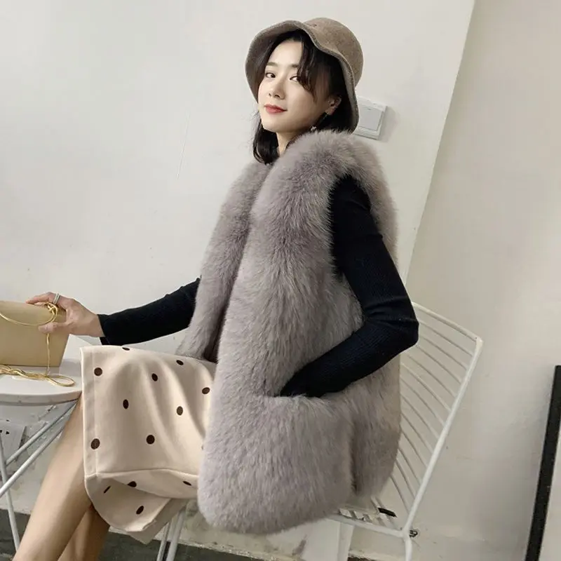 New Women's Vest Sleeveless Pockets Female Autumn Winter Faux Fur Coat Fox Fur Vest Tops Warm Waistcoat Long Vest Ladies N34
New Women's Vest Sleeveless Pockets Female Autumn Winter Faux Fur Coat Fox Fur Vest Tops Warm Waistcoat Long Vest Ladies N34