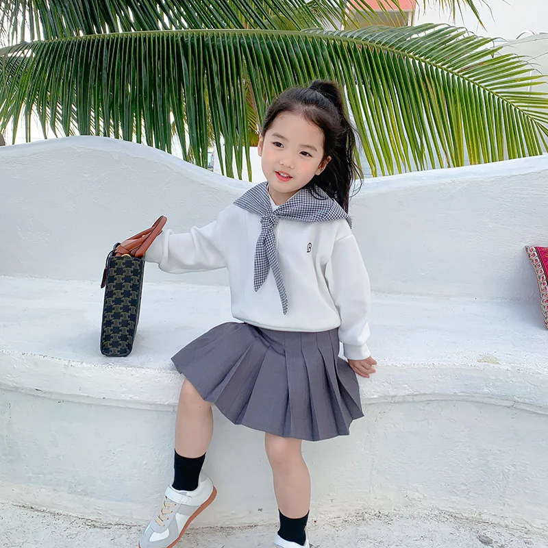 Girls' spring and Autumn New College style short skirt solid color Korean version children's high waist thin a-word skirt 3-217
Girls' spring and Autumn New College style short skirt solid color Korean version children's high waist thin a-word skirt 3-217