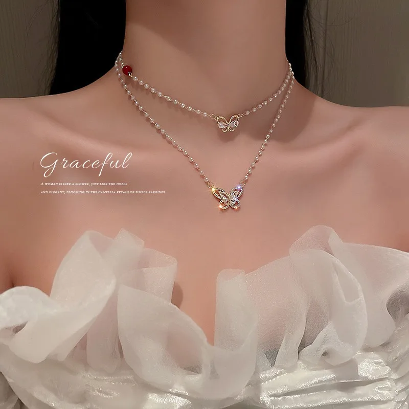 Korean Elegant Pearl Necklace Female Fashion Rhinestone Heart Pendent Choker Shiny Butterfly Double Layer Clavicle Chain Jewelry
Korean Elegant Pearl Necklace Female Fashion Rhinestone Heart Pendent Choker Shiny Butterfly Double Layer Clavicle Chain Jewelry