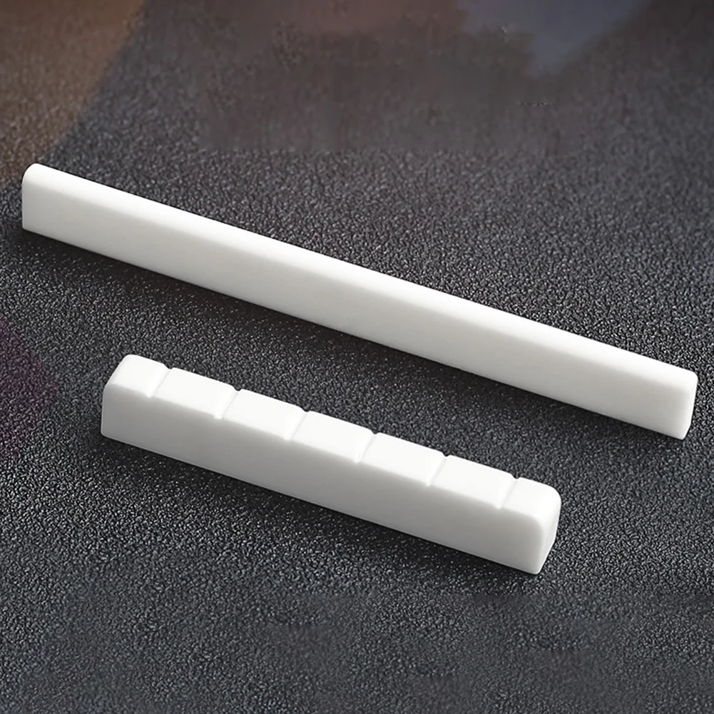 6 String Bone Classical Guitar Bridge Saddle And Nut Replacement Parts 80mm 52mm Make Guitar Instrument Accessories Wholesale
6 String Bone Classical Guitar Bridge Saddle And Nut Replacement Parts 80mm 52mm Make Guitar Instrument Accessories Wholesale