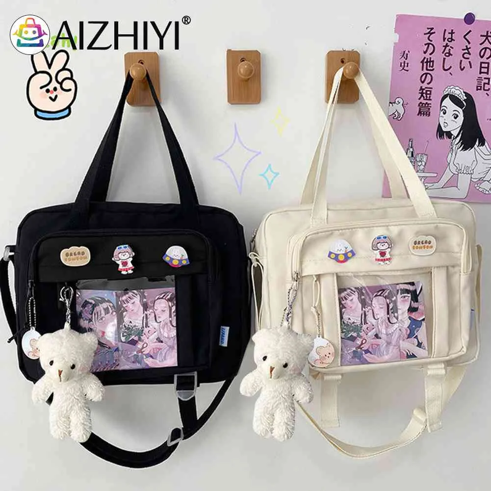 Fashion Female Messenger Bags Pendant Badges Crossbody Messenger Handbags Large Capacity Messenger Handbags for High School Girl
Fashion Female Messenger Bags Pendant Badges Crossbody Messenger Handbags Large Capacity Messenger Handbags for High School Girl