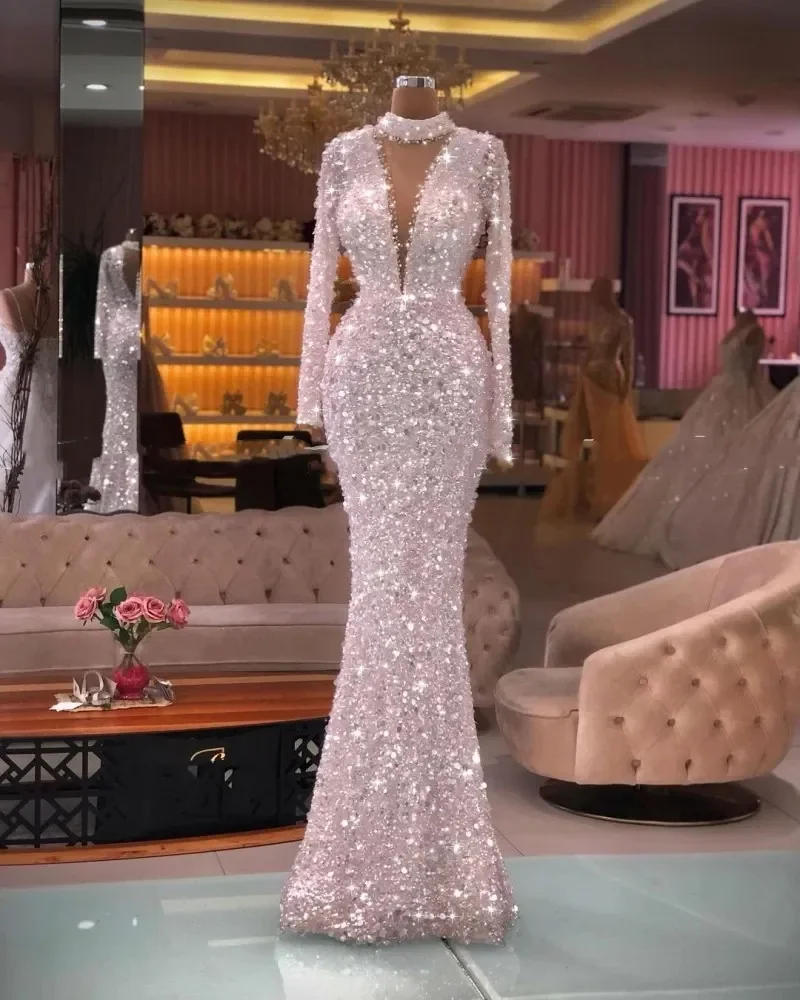 New Gorgeous Mermaid Evening Dresses High Neck Long Sleeve Floor-Length Sweep Train Beaded Crystal Sequined long Illusion Custom
New Gorgeous Mermaid Evening Dresses High Neck Long Sleeve Floor-Length Sweep Train Beaded Crystal Sequined long Illusion Custom