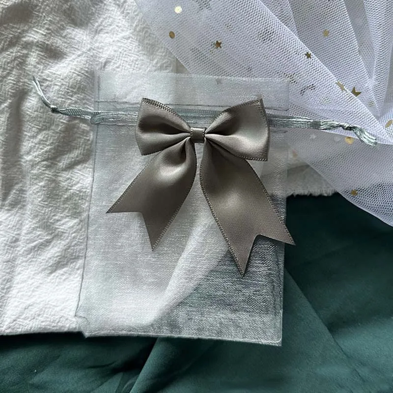 Подарочные пакеты из органзы с бантом
Подарочные пакеты из органзы с бантом