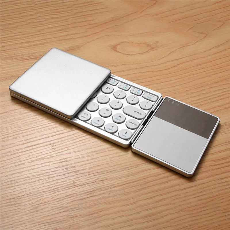 Foldable Bluetooth Keyboard Wireless Keypad with Touchpad Rechargeable for Tablet Notebook Android Windows Phone, Silver
Foldable Bluetooth Keyboard Wireless Keypad with Touchpad Rechargeable for Tablet Notebook Android Windows Phone, Silver