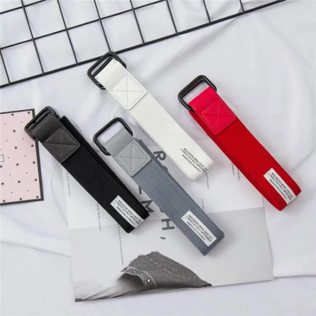 Black double-buckle casual canvas belt unisex double-loop buckle belt fashion extended belts for young students.
Black double-buckle casual canvas belt unisex double-loop buckle belt fashion extended belts for young students.