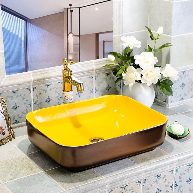 Washbasin on stage rectangular ceramic metal tablebasin household art creative personalized washbasin European washbasin
Washbasin on stage rectangular ceramic metal tablebasin household art creative personalized washbasin European washbasin