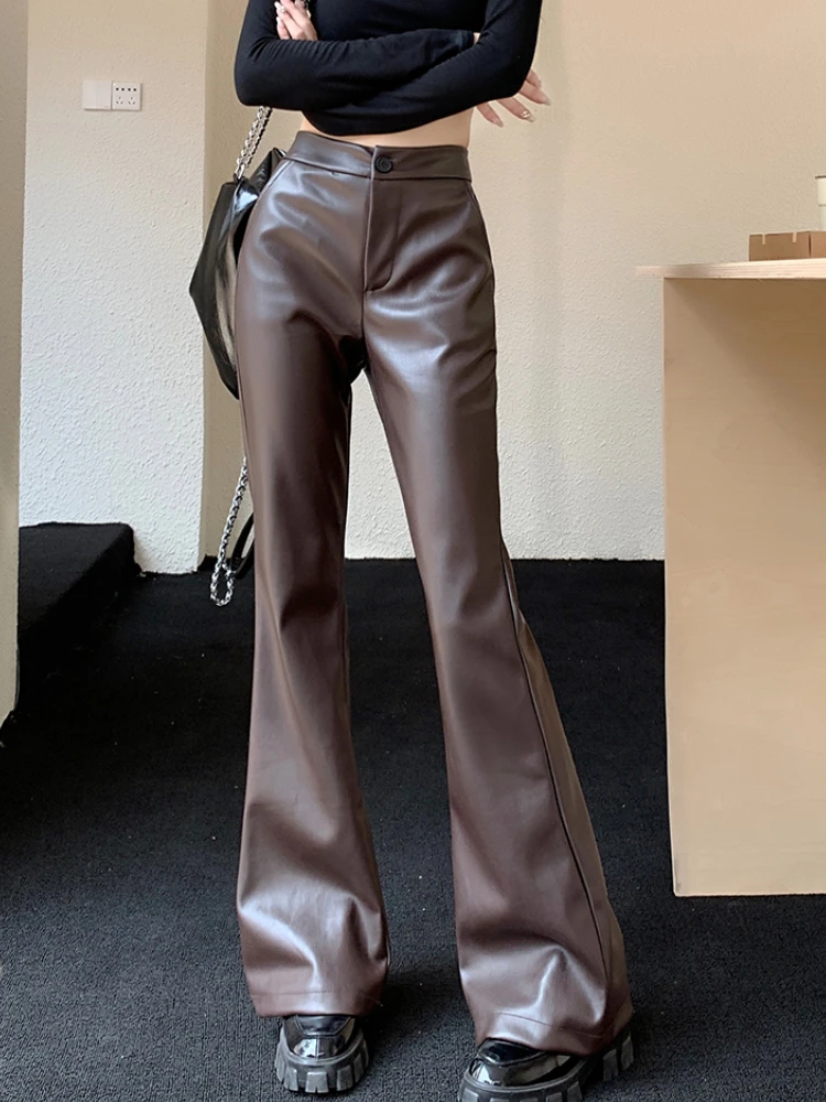 Узкие кожаные брюки с высокой талией, женские модные брюки-клеш в Корейском стиле, новинка сезона осень-зима 2023, винтажные свободные женские брюки из искусственной кожи
Узкие кожаные брюки с высокой талией, женские модные брюки-клеш в Корейском стиле, новинка сезона осень-зима 2023, винтажные свободные женские брюки из искусственной кожи