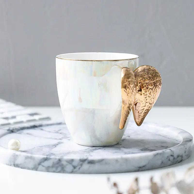 Fairy Cup Golden Angel Wings ceramic cup pearl glaze creative coffee cup milk tea cup wedding gift cup
Fairy Cup Golden Angel Wings ceramic cup pearl glaze creative coffee cup milk tea cup wedding gift cup