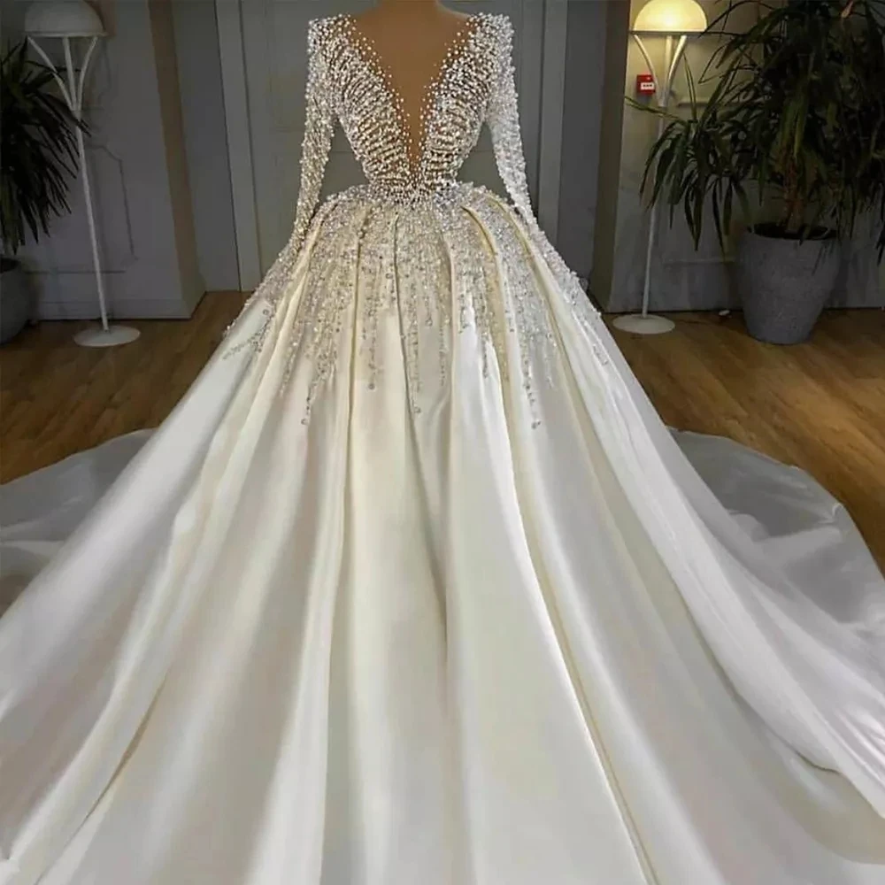 

Бальное платье принцессы с глубоким V-образным вырезом и длинным рукавом, свадебное платье с бусинами и жемчугом, атласное свадебное платье ...