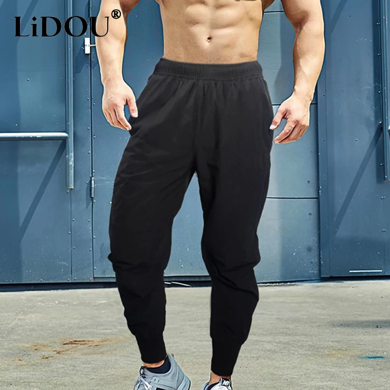 Sports Jogging Running Solid Pants Men Thin Male Sweatpants Quick Dry Gym Trackpants Slim Fitness Training Bodybuilding Trousers 
Sports Jogging Running Solid Pants Men Thin Male Sweatpants Quick Dry Gym Trackpants Slim Fitness Training Bodybuilding Trousers
