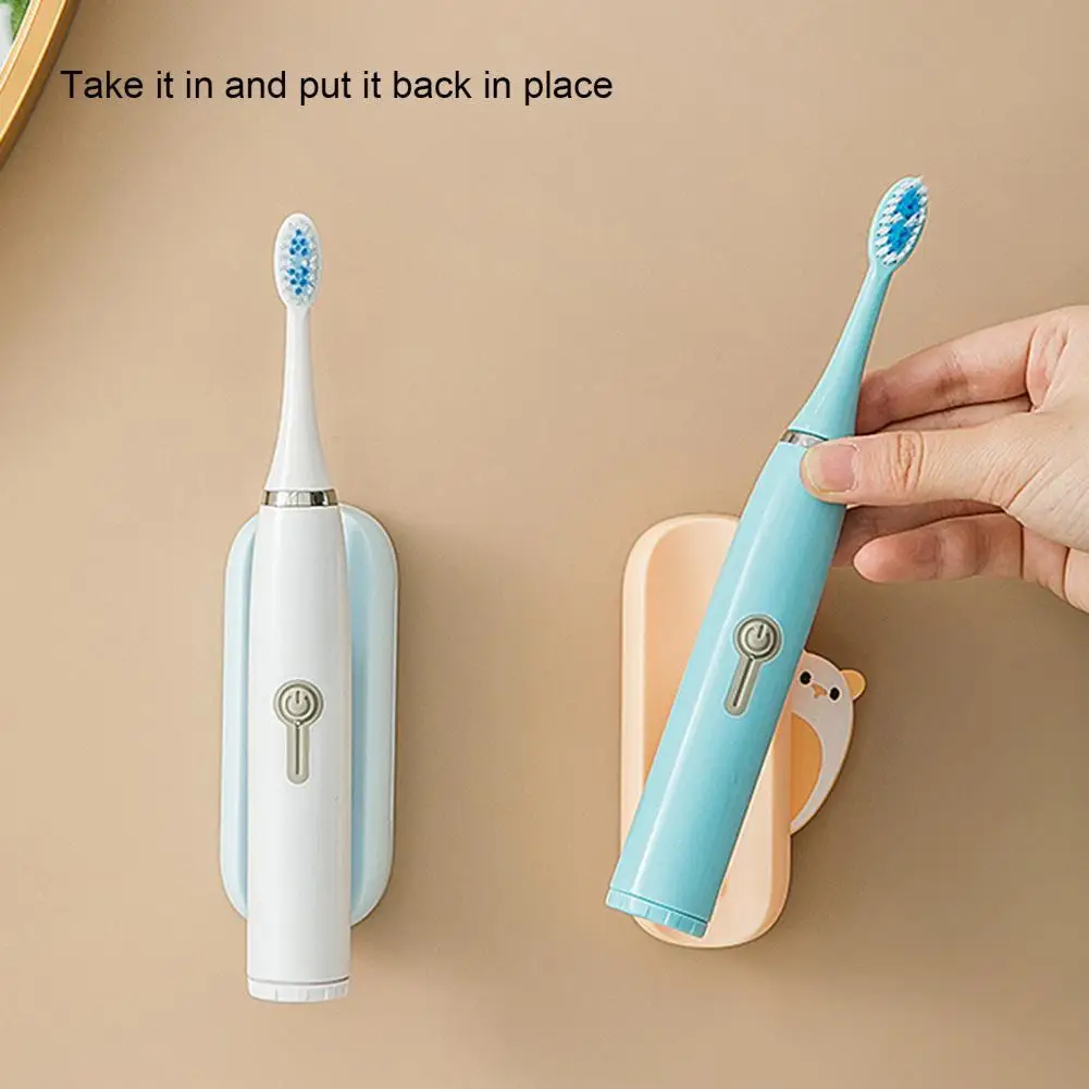 Waterproof Self Adhesive Electric Toothbrush Holder Plastic Practical Anti-slid Slot Toothbrush Holder Rack for Home 
Waterproof Self Adhesive Electric Toothbrush Holder Plastic Practical Anti-slid Slot Toothbrush Holder Rack for Home