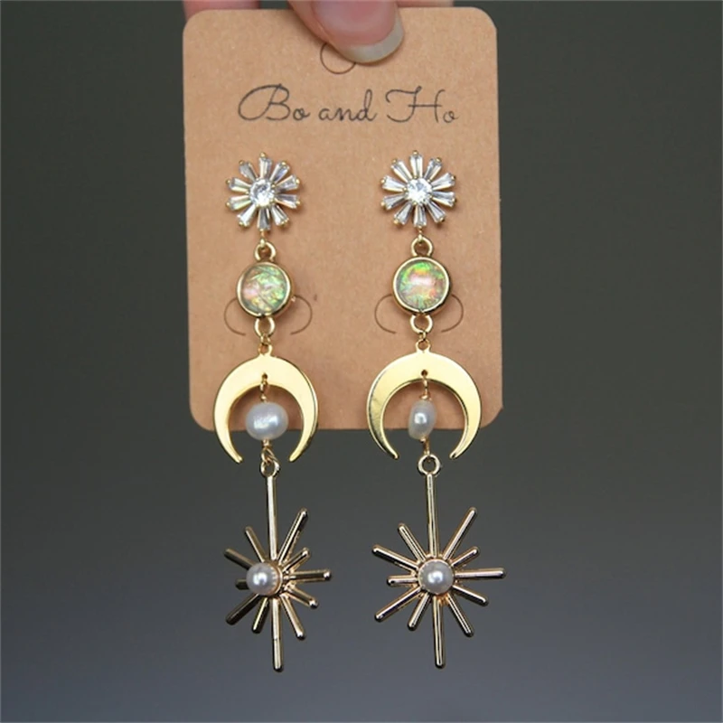 Boho Style Inlaid Pearl Sun Beaded Moon Crystal Floral Pendant Earrings Fashion Charm Women's Drop Earrings Anniversary Jewelry
Boho Style Inlaid Pearl Sun Beaded Moon Crystal Floral Pendant Earrings Fashion Charm Women's Drop Earrings Anniversary Jewelry