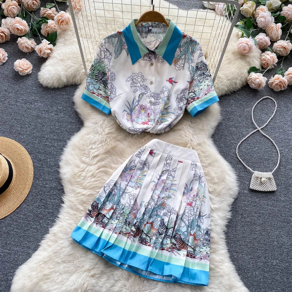 Fashion suit 2022 new women's summer high-end positioning printed shirt pleated skirt temperament age reduction two-piece set
Fashion suit 2022 new women's summer high-end positioning printed shirt pleated skirt temperament age reduction two-piece set