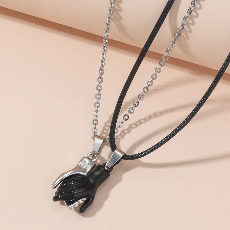 Hip Hop Handshake Creativity Magnet Attraction Men and Women Hold Hands Pendant Couple Simple Fashion Necklace
Hip Hop Handshake Creativity Magnet Attraction Men and Women Hold Hands Pendant Couple Simple Fashion Necklace