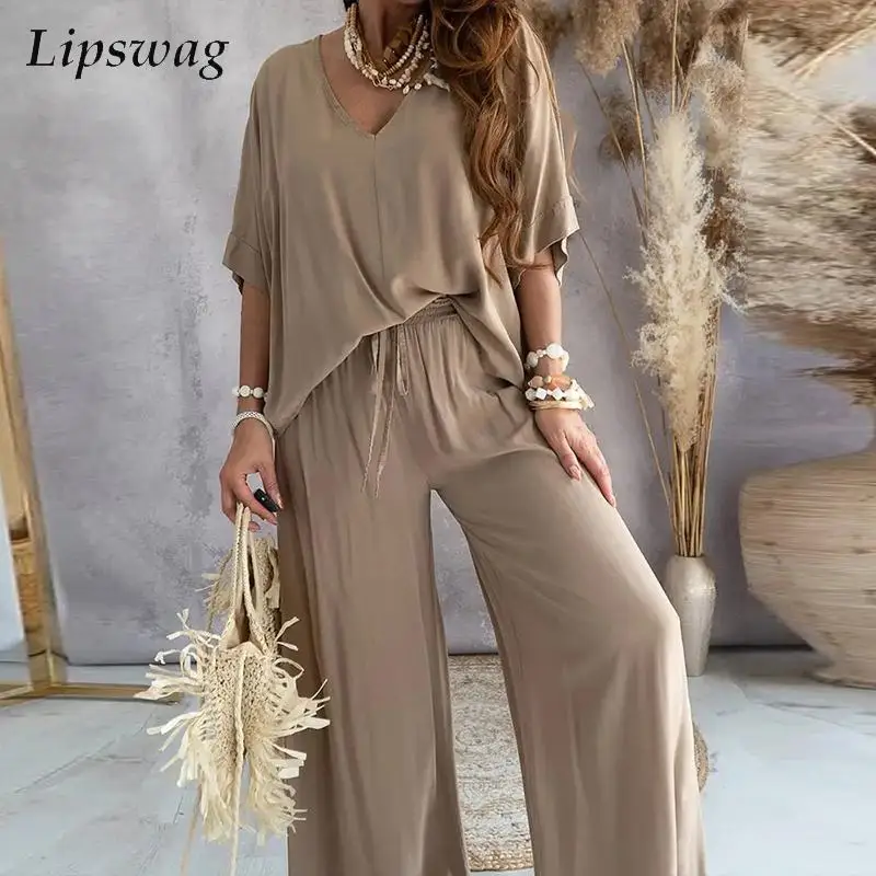 Однотонный женский свободный домашний костюм, привлекательная футболка с V-образным вырезом и рукавом летучая мышь, пуловер и брюки на шнур...
Однотонный женский свободный домашний костюм, привлекательная футболка с V-образным вырезом и рукавом летучая мышь, пуловер и брюки на шнур...