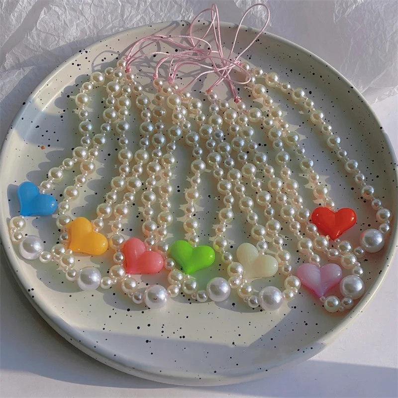Creative Design Color Resin Peach Heart Beaded Mobile Phone Lanyard Personality Female Imitation Pearl Mobile Phone Chain
Creative Design Color Resin Peach Heart Beaded Mobile Phone Lanyard Personality Female Imitation Pearl Mobile Phone Chain