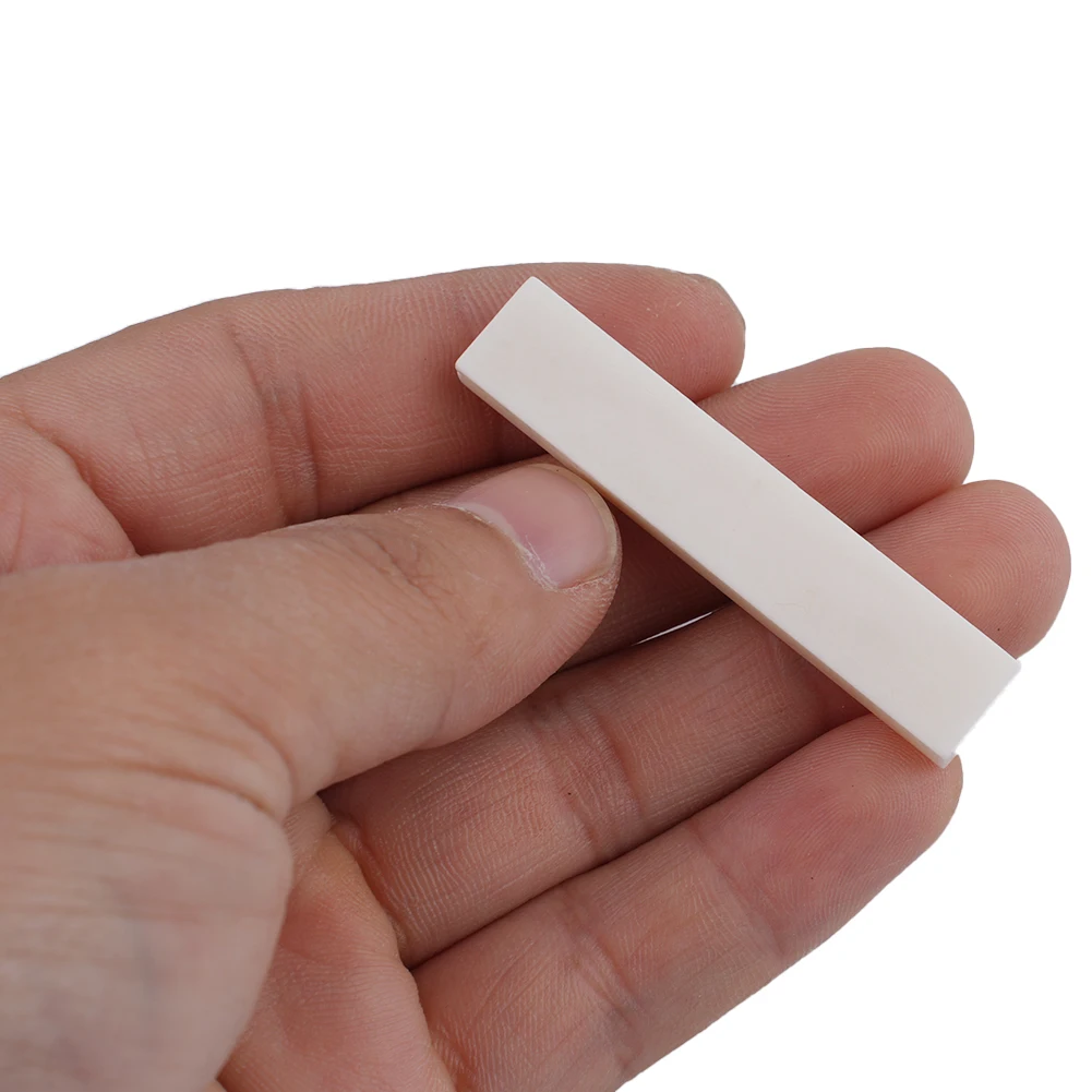 Universal Blank Bone Nut 52x10x6mm Luthier Saddle Bridge DIY Guitar Bass Ukulele Accessories For Any Instrumentos Musicales
Universal Blank Bone Nut 52x10x6mm Luthier Saddle Bridge DIY Guitar Bass Ukulele Accessories For Any Instrumentos Musicales