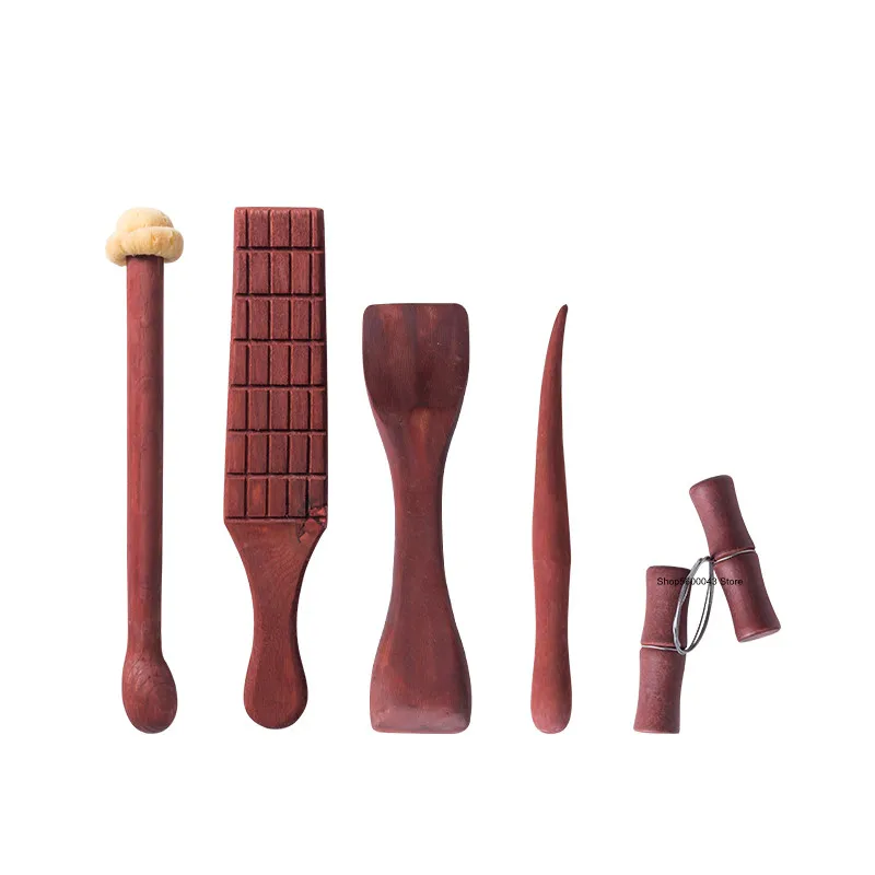 5pcs Set of Mahogany Making Teapot Tools Pottery Art Purple Clay Pot Handmade Tools Pottery Art DIY Pottery Pot Modeling Tools
5pcs Set of Mahogany Making Teapot Tools Pottery Art Purple Clay Pot Handmade Tools Pottery Art DIY Pottery Pot Modeling Tools
