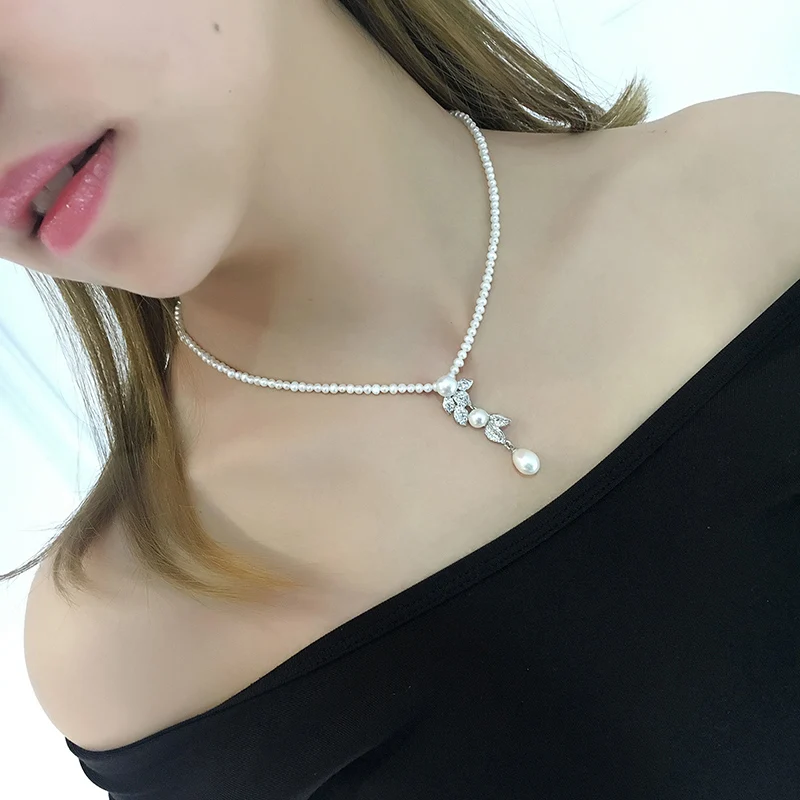 Hot sell new style 38cm 3-4mm white freshwater pearl necklace leaves zircon accessories fashion jewelry
Hot sell new style 38cm 3-4mm white freshwater pearl necklace leaves zircon accessories fashion jewelry