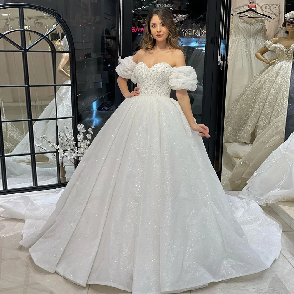 Furtanseo Elegant Glitter Wedding Dresses 2023 Off Shoulder Shiny Puff Sleeves A-Line Bridal Gowns Sparkly Princess Bride Dress
Furtanseo Elegant Glitter Wedding Dresses 2023 Off Shoulder Shiny Puff Sleeves A-Line Bridal Gowns Sparkly Princess Bride Dress