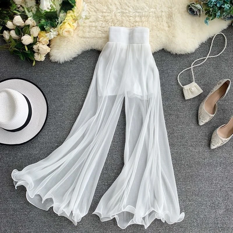 Женские летние брюки с широкими штанинами, расклешенные брюки с оборками «рыбий хвост», модные плиссированные брюки с эластичной талией в западном стиле
Женские летние брюки с широкими штанинами, расклешенные брюки с оборками «рыбий хвост», модные плиссированные брюки с эластичной талией в западном стиле