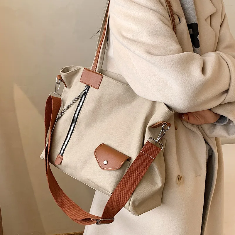 Canvas Handbags Large Capacity2022new Fashion Ladies Wide Shoulder Strap Messenger Bag Texture Single Shoulder Commuter Tote Bag
Canvas Handbags Large Capacity2022new Fashion Ladies Wide Shoulder Strap Messenger Bag Texture Single Shoulder Commuter Tote Bag