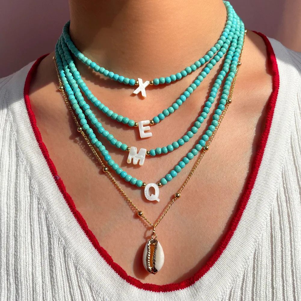 2023 Trendy Boho Turquoise Beads Choker Jewelry Custom Double-Layer Freshwater Shell Letter Charm Necklace for Summer Beach
2023 Trendy Boho Turquoise Beads Choker Jewelry Custom Double-Layer Freshwater Shell Letter Charm Necklace for Summer Beach