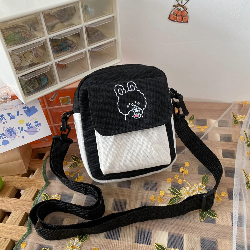 Canvas Women‘s Phone Bag Cartoon Printed Shoulder Messenger Bag Hit Color Flap Purse Casual Handbag Female Shopping Bag
Canvas Women‘s Phone Bag Cartoon Printed Shoulder Messenger Bag Hit Color Flap Purse Casual Handbag Female Shopping Bag
