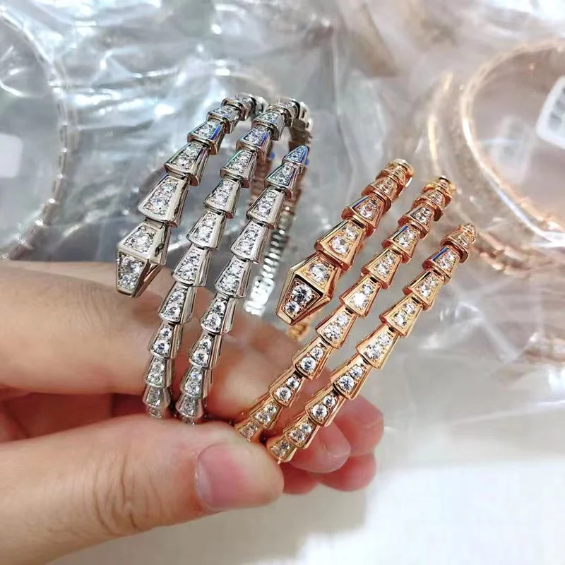 European high-end jewelry sterling silver inlaid zircon double ring snake bone bracelet, women's fashion luxury brand
European high-end jewelry sterling silver inlaid zircon double ring snake bone bracelet, women's fashion luxury brand