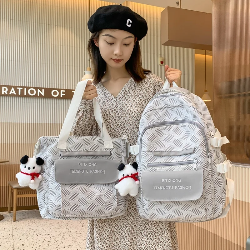 Summer New Women Backpack Cute Pendant School Bag for Girls Large Capacity Travel Bags Nylon Waterproof Shoulder Bags Mochila
Summer New Women Backpack Cute Pendant School Bag for Girls Large Capacity Travel Bags Nylon Waterproof Shoulder Bags Mochila