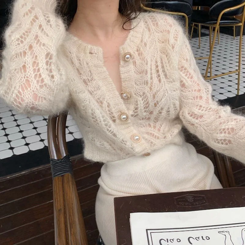 Spring Summer New Small Fragrance Hook Flower Hollow Sweater Cardigan Foreign Lace Knitted Women Fashion Small Coat Tide
Spring Summer New Small Fragrance Hook Flower Hollow Sweater Cardigan Foreign Lace Knitted Women Fashion Small Coat Tide