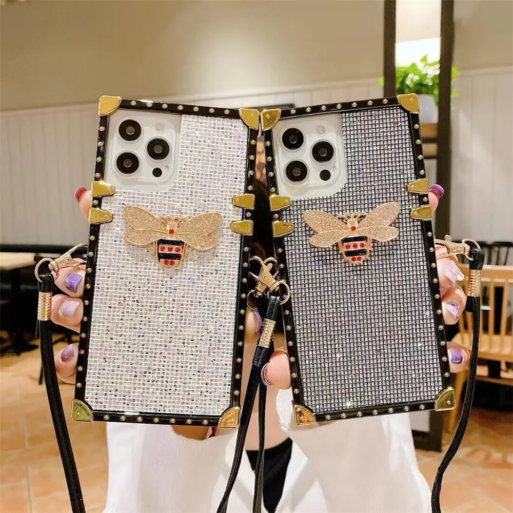 Luxury Bling Gold Bee Cover Glitter Square Lanyard Case for Samsung Galaxy A54 A14 A52 A32 A72 A22 A42 A12 A13 A53 A23 A33 A21S
Luxury Bling Gold Bee Cover Glitter Square Lanyard Case for Samsung Galaxy A54 A14 A52 A32 A72 A22 A42 A12 A13 A53 A23 A33 A21S