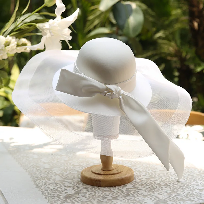 2022 New exquisite and elegant French satin top hat retro socialite party photo studio accessories bridal wedding top hat
2022 New exquisite and elegant French satin top hat retro socialite party photo studio accessories bridal wedding top hat