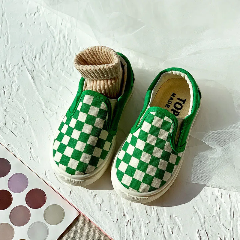 2022 spring and autumn new children's black and white plaid canvas shoes boys and girls checkerboard one-step pedal shoes
2022 spring and autumn new children's black and white plaid canvas shoes boys and girls checkerboard one-step pedal shoes