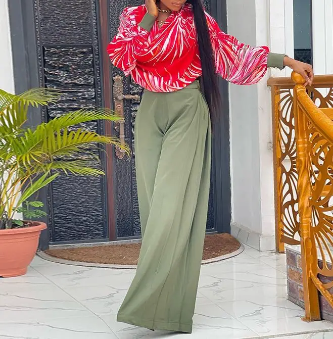 Fashion Print Design Women's Two-Piece 2023 Hot Selling Fresh and Sweet Casual Lantern Sleeve Shirt Pockets Wide Leg Pants Set
Fashion Print Design Women's Two-Piece 2023 Hot Selling Fresh and Sweet Casual Lantern Sleeve Shirt Pockets Wide Leg Pants Set