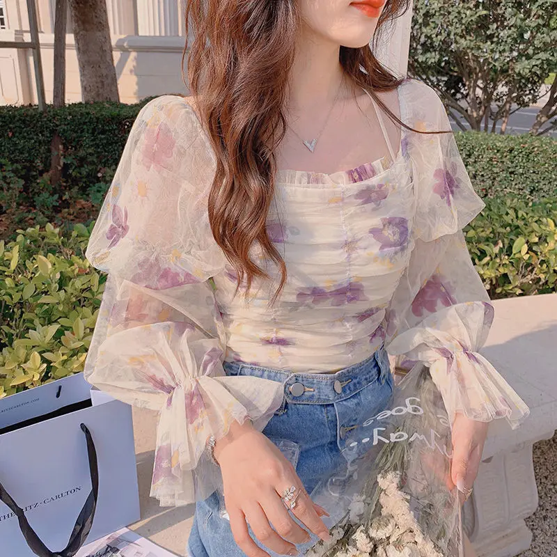 Summer Floral Chiffon Blouse Women Elegant Kawaii Korean Chic Sweet Blouse Designer Casual Puff Sleeve Outdoor Slim Blouse 2021
Summer Floral Chiffon Blouse Women Elegant Kawaii Korean Chic Sweet Blouse Designer Casual Puff Sleeve Outdoor Slim Blouse 2021