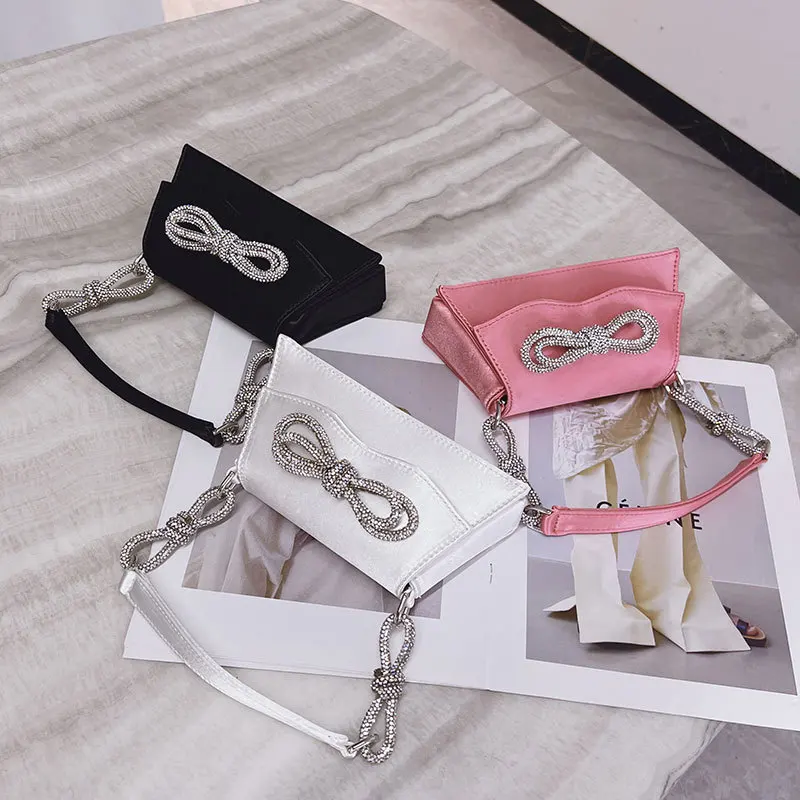 Bow Knot Diamond Hand-held Shoulder Women's Evening Bag Mini Cute Shiny Fashion All-match 2022 Luxury Designer Small Square Bag
Bow Knot Diamond Hand-held Shoulder Women's Evening Bag Mini Cute Shiny Fashion All-match 2022 Luxury Designer Small Square Bag
