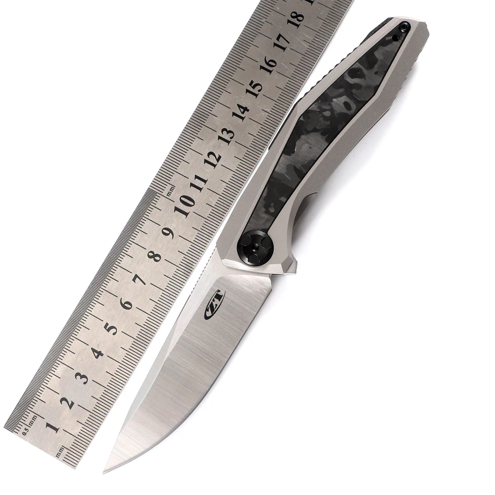 Складной нож ZT0470, клинок с лезвием 20CV, титановая ручка с инкрустацией из углеродного волокна, инкрустированный уличный инструмент для кемпинга, выживания, охоты, повседневного использования
Складной нож ZT0470, клинок с лезвием 20CV, титановая ручка с инкрустацией из углеродного волокна, инкрустированный уличный инструмент для кемпинга, выживания, охоты, повседневного использования