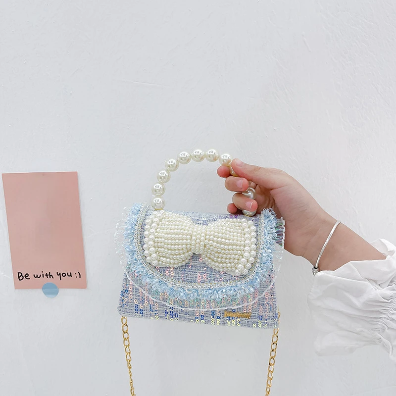 Детская модная сумка с милым бантом, боковые сумки через плечо для девочек, сумка-тоут с жемчугом, ручная сумка, детские сумки-мессенджеры, к... 
Детская модная сумка с милым бантом, боковые сумки через плечо для девочек, сумка-тоут с жемчугом, ручная сумка, детские сумки-мессенджеры, к...